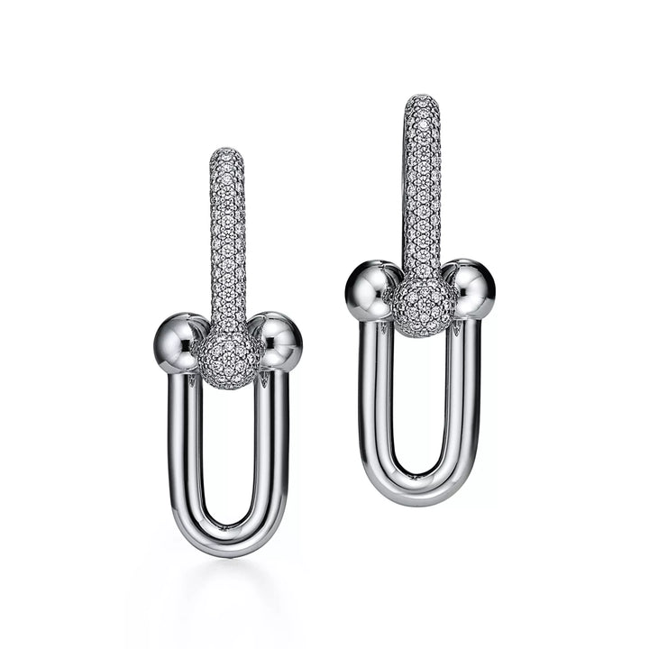 Link earrings set with zirconia stones